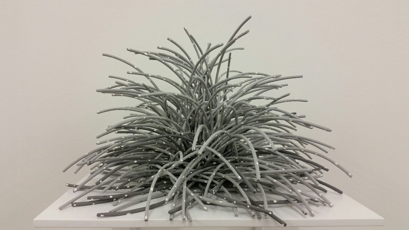 Bean Finneran: grey sculpture with white dots