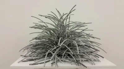 Bean Finneran: grey sculpture with white dots
